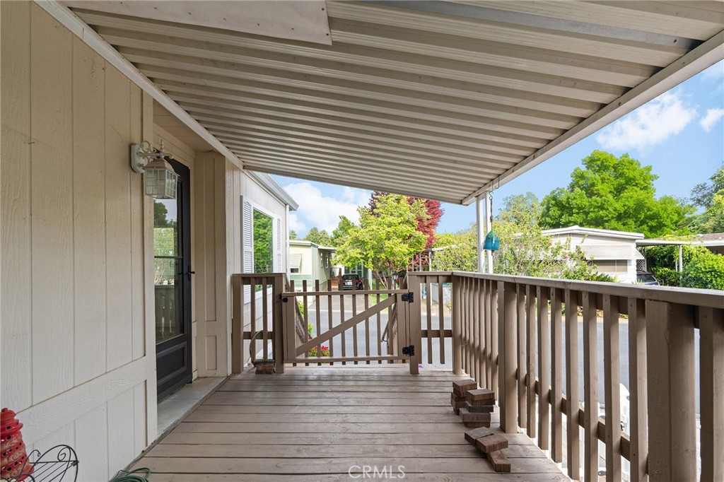 1901 Dayton, Unit 128 Chico, CA 95928 - Photo 5 of 44 a view of a balcony with wooden floor