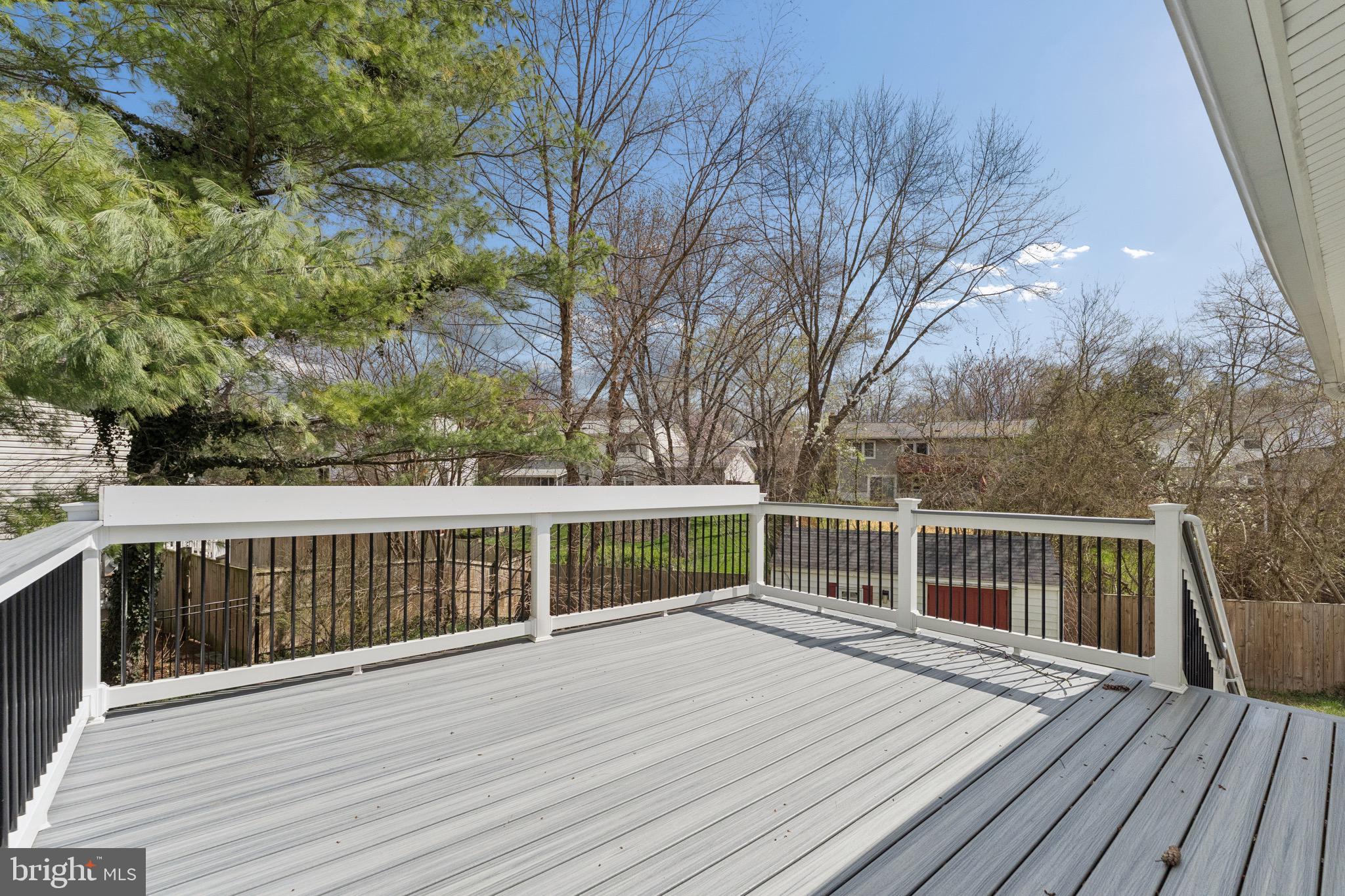 8910 Spur Road Springfield, VA 22153 - Photo 25 of 45 a view of balcony with wooden floor and fence
