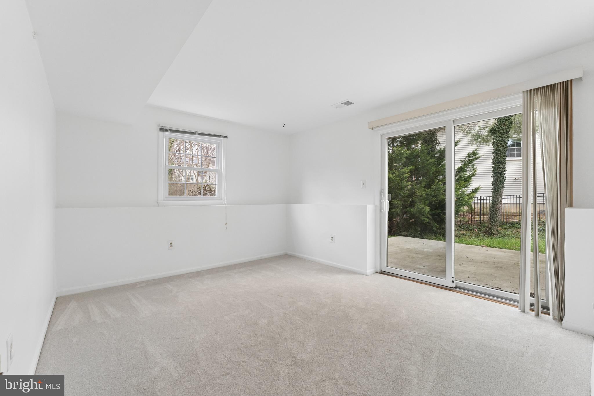 8910 Spur Road Springfield, VA 22153 - Photo 31 of 45 an empty room with windows