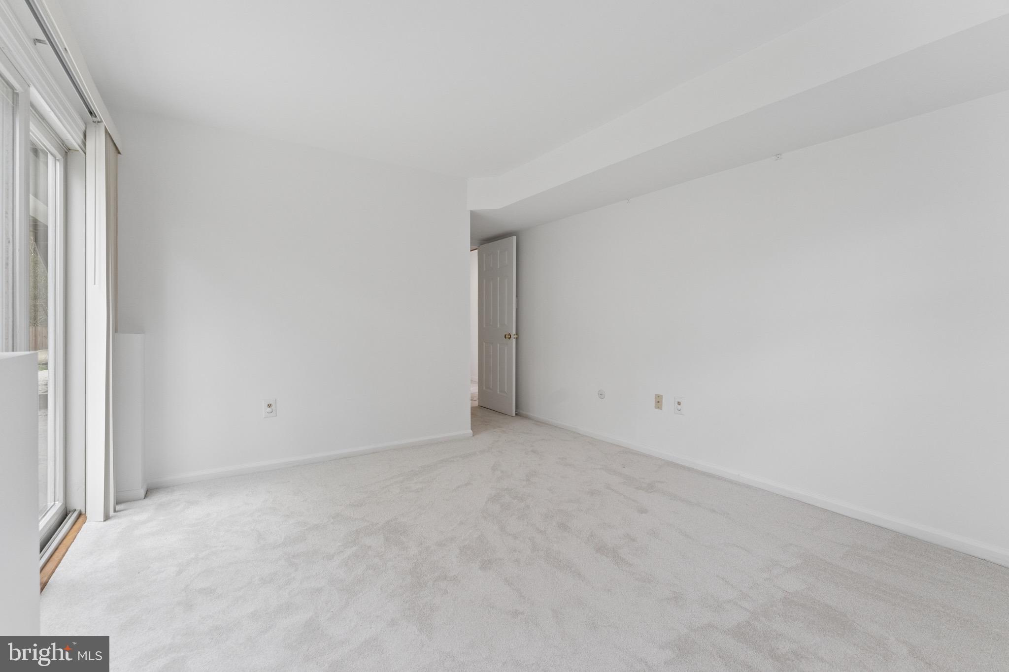 8910 Spur Road Springfield, VA 22153 - Photo 32 of 45 a view of an empty room and a window