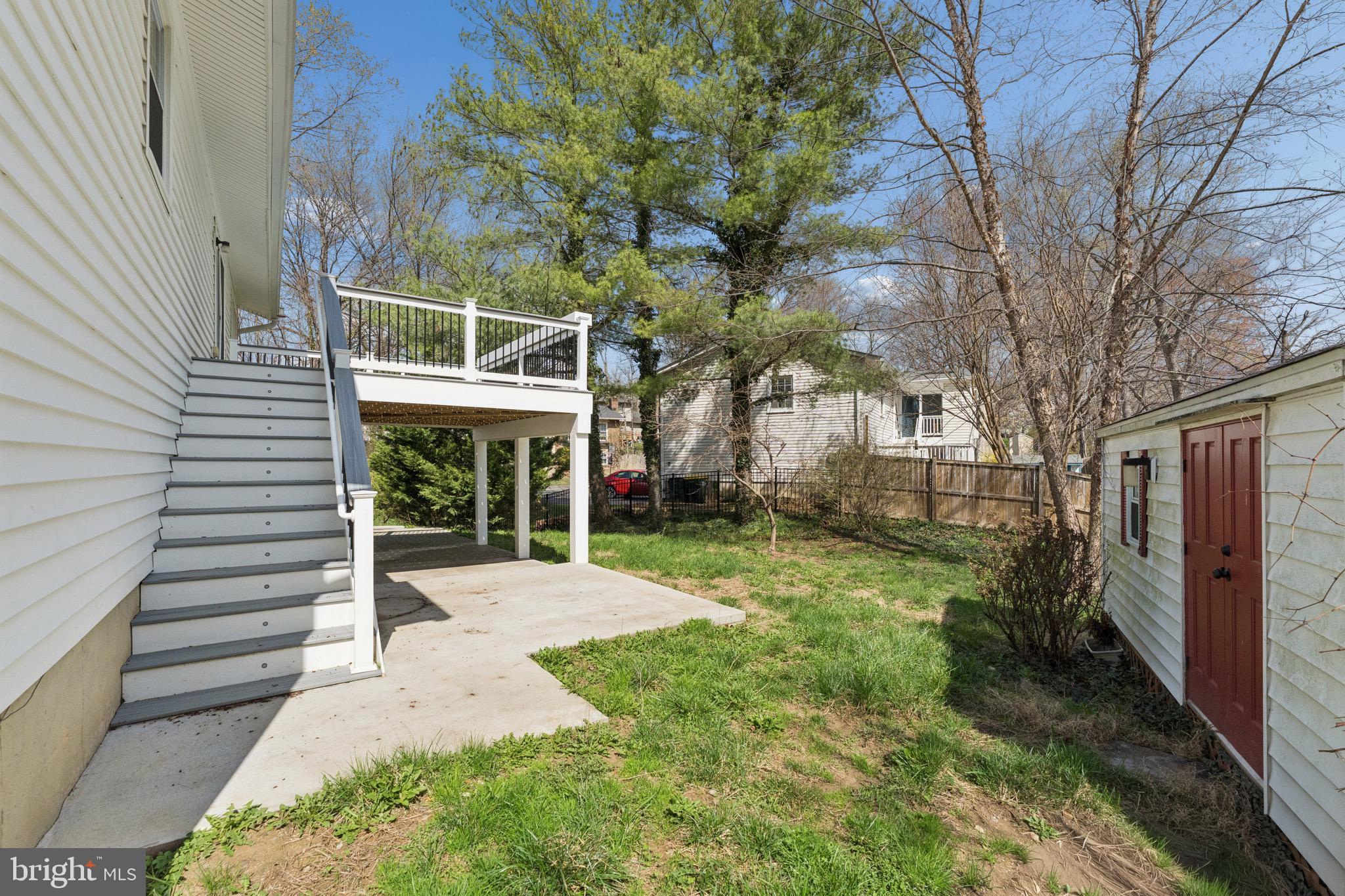 8910 Spur Road Springfield, VA 22153 - Photo 41 of 45 a house with trees in front of it