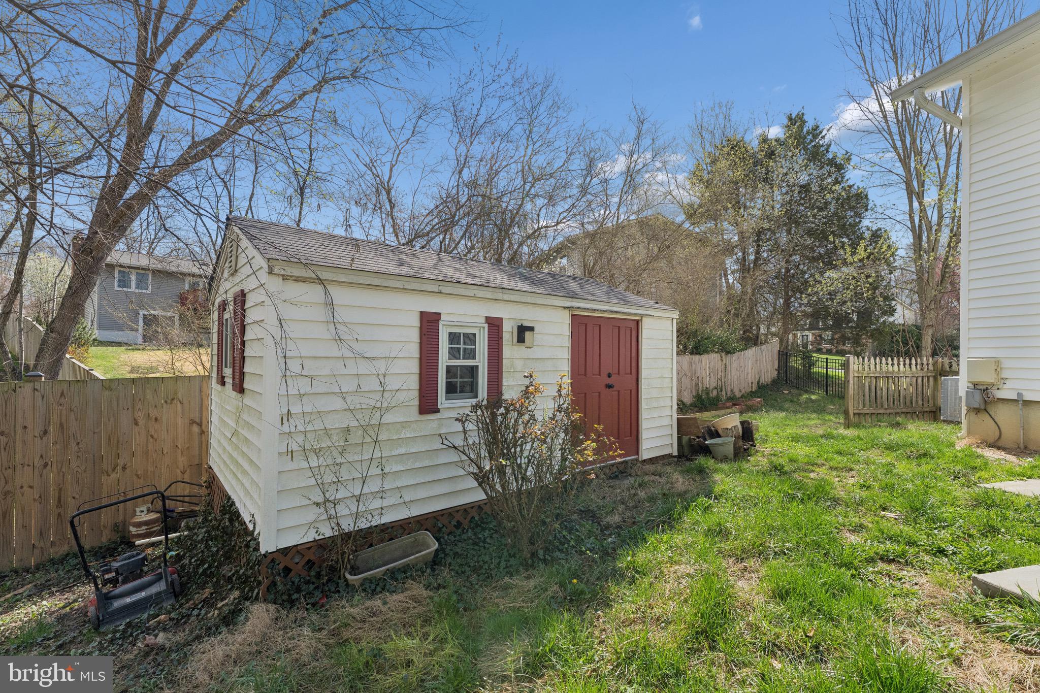 8910 Spur Road Springfield, VA 22153 - Photo 42 of 45 a view of a house with a yard