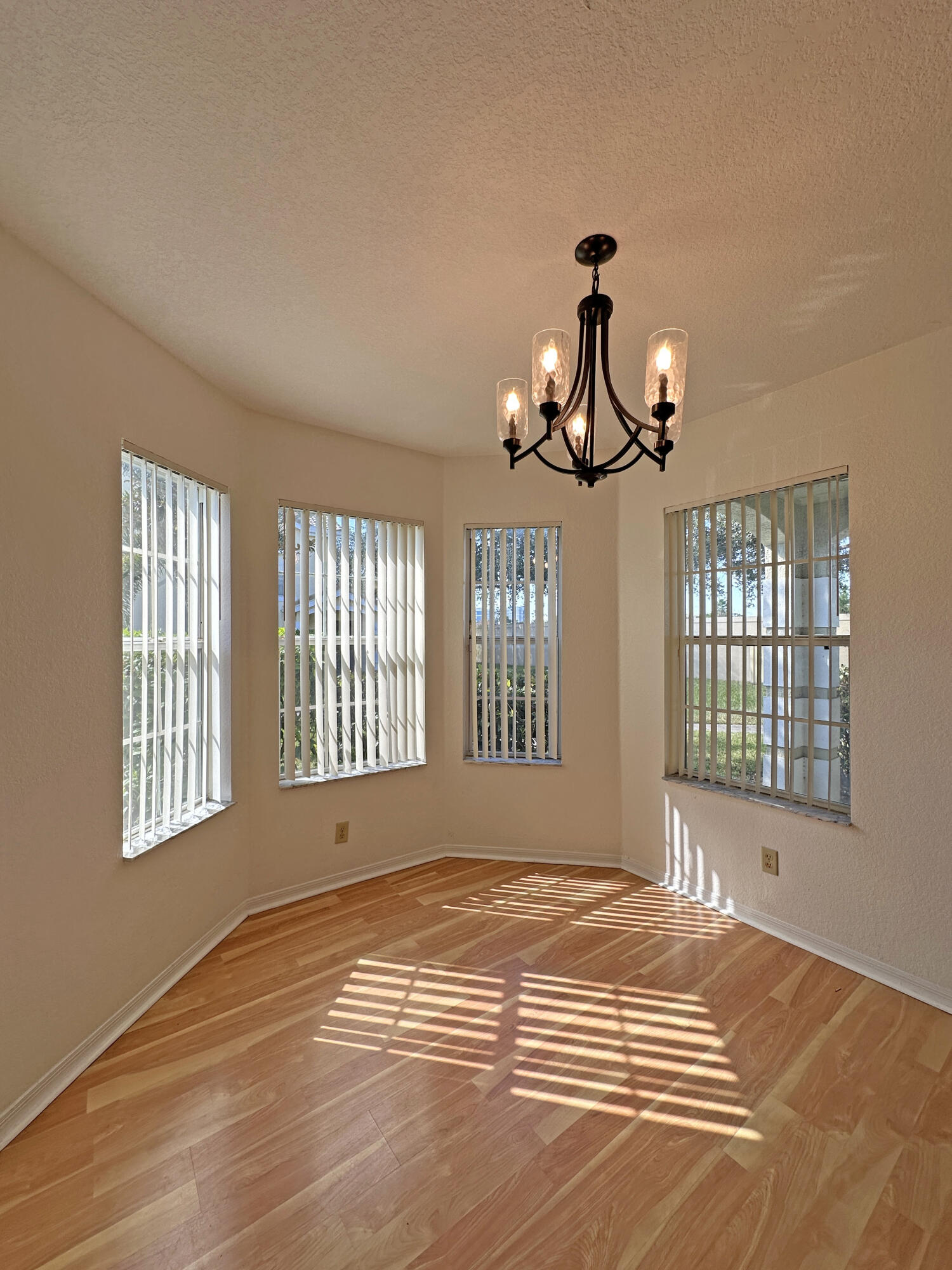 166 Southwest Peacock Boulevard, Unit 104 Port St. Lucie, FL 34986 - Photo 9 of 45 a view of a room with a window