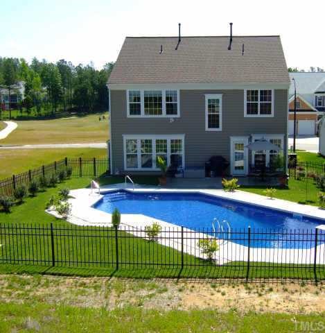 3323 Cathedral Bell Road Raleigh, NC 27614 - Photo 3 of 12 a view of a house with backyard and sitting area
