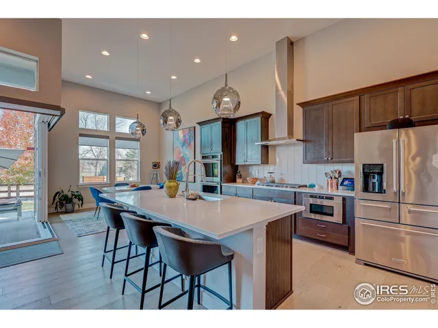 a living room with fireplace furniture and a flat screen tv
