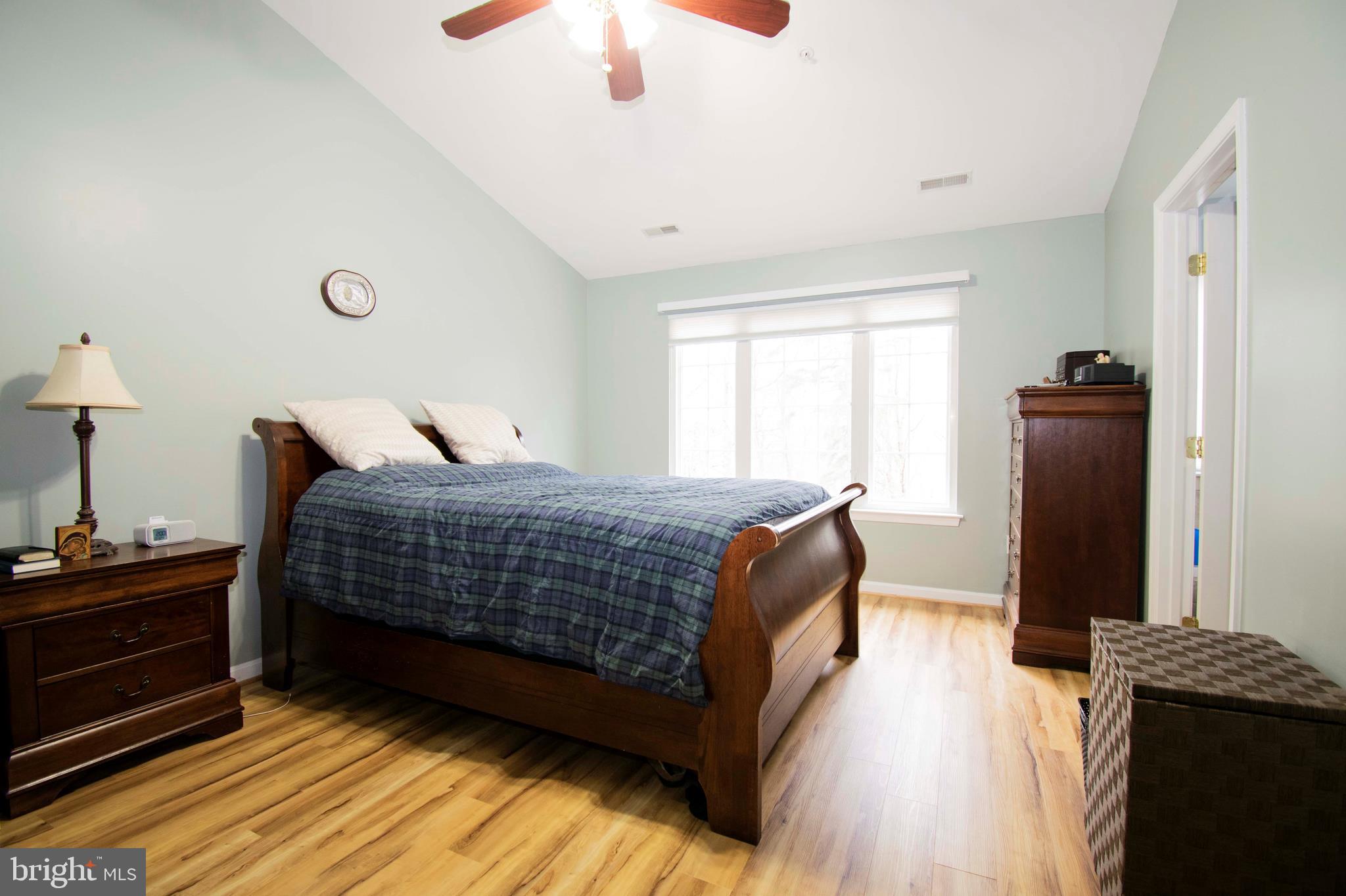 2556 Running Wolf Trail Odenton, MD 21113 - Photo 9 of 36 CathCeilingsMstr w/laminatewoodstyleFloors