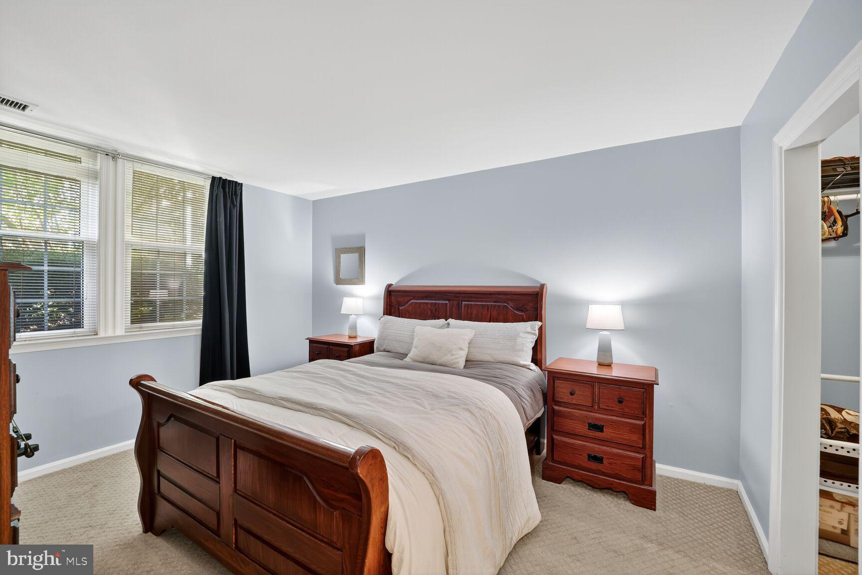 4519 28th Road South, Unit A Arlington, VA 22206 - Photo 12 of 33 a bedroom with a bed and a large window