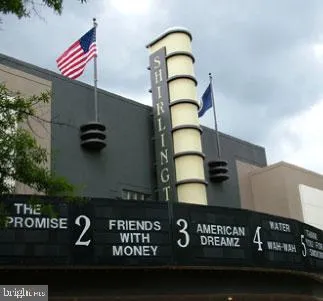 a front view of building with an outdoor seating