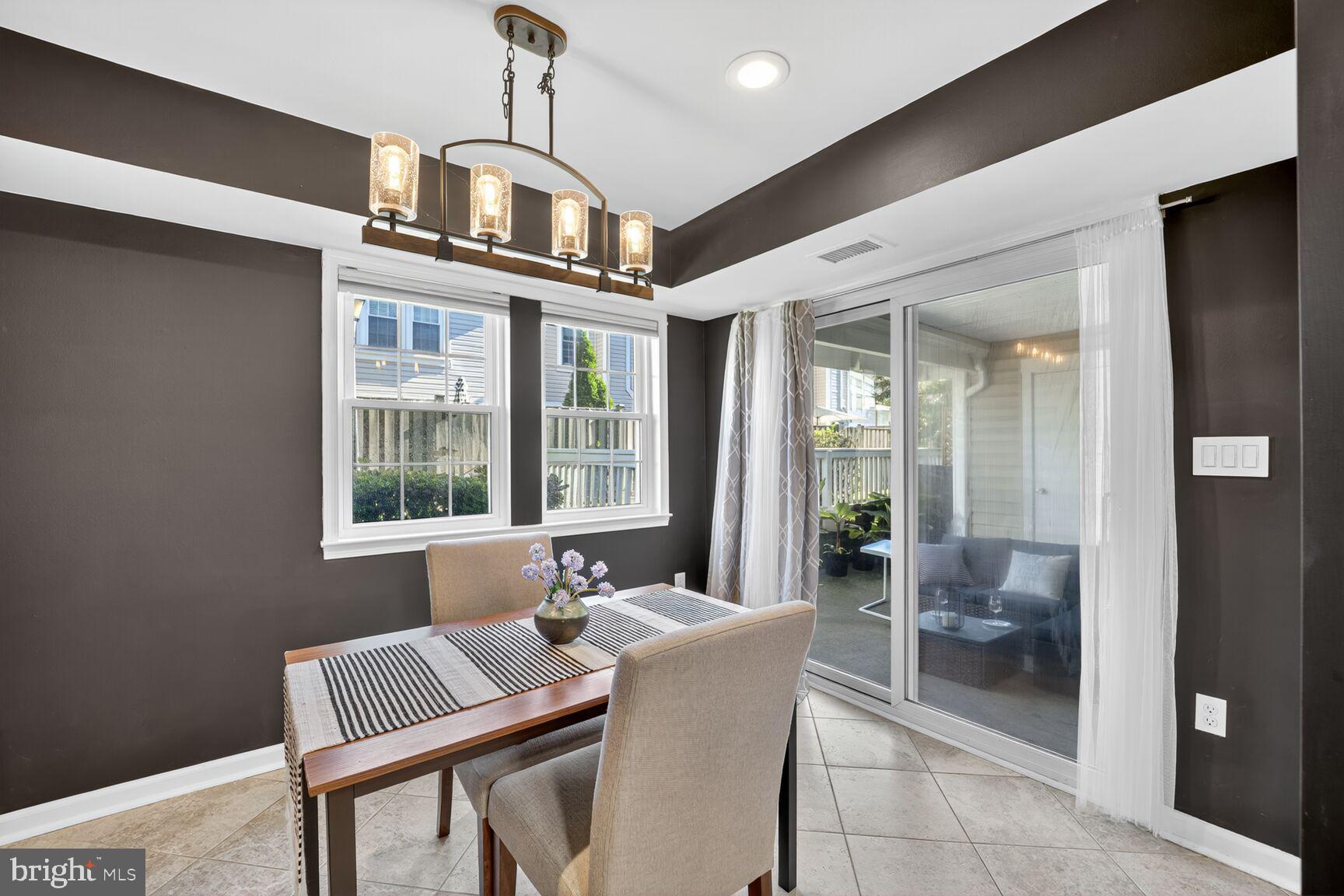4519 28th Road South, Unit A Arlington, VA 22206 - Photo 6 of 33 a dining room with furniture and window