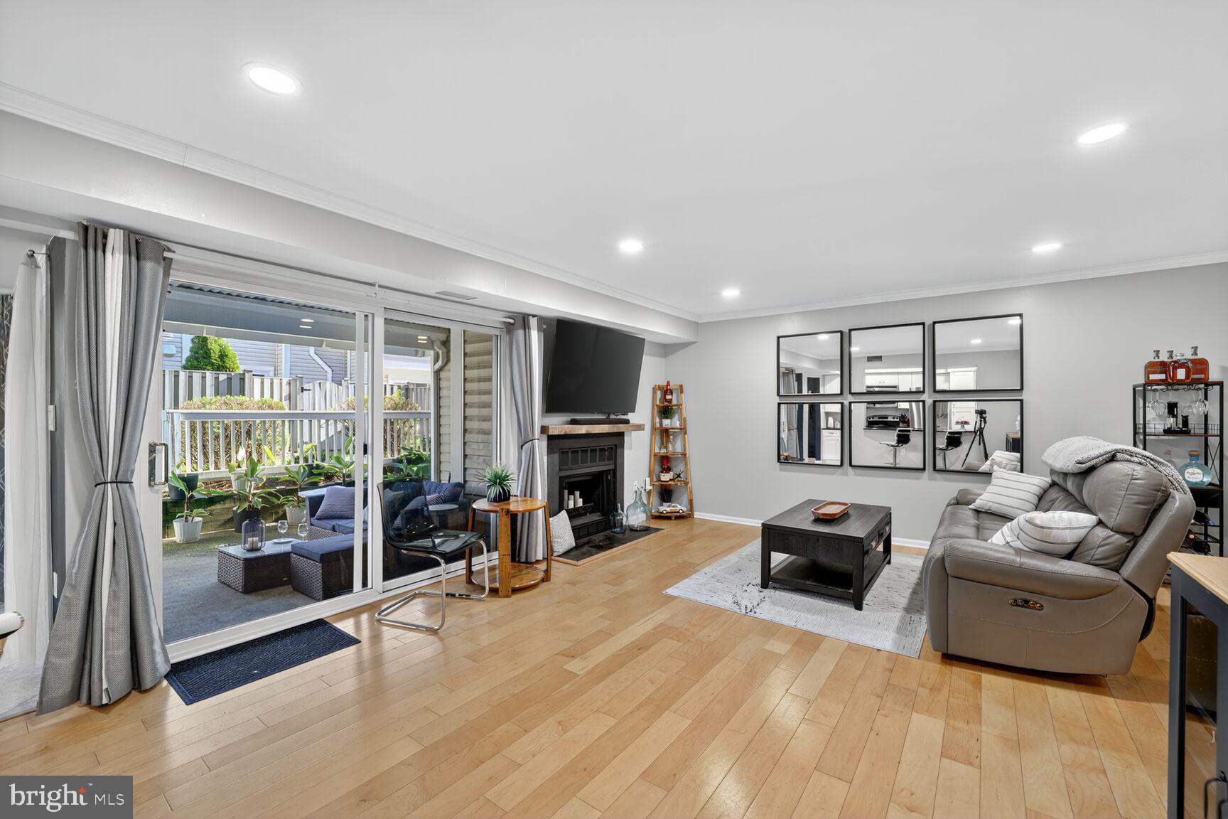4519 28th Road South, Unit A Arlington, VA 22206 - Photo 8 of 33 a living room with furniture and a flat screen tv