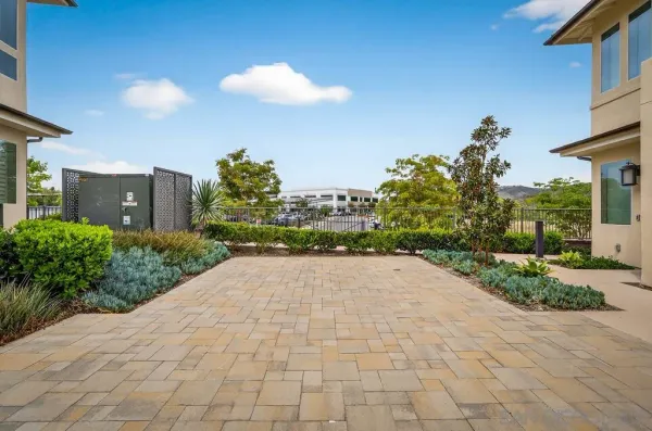 a view of swimming pool with outdoor seating and a patio