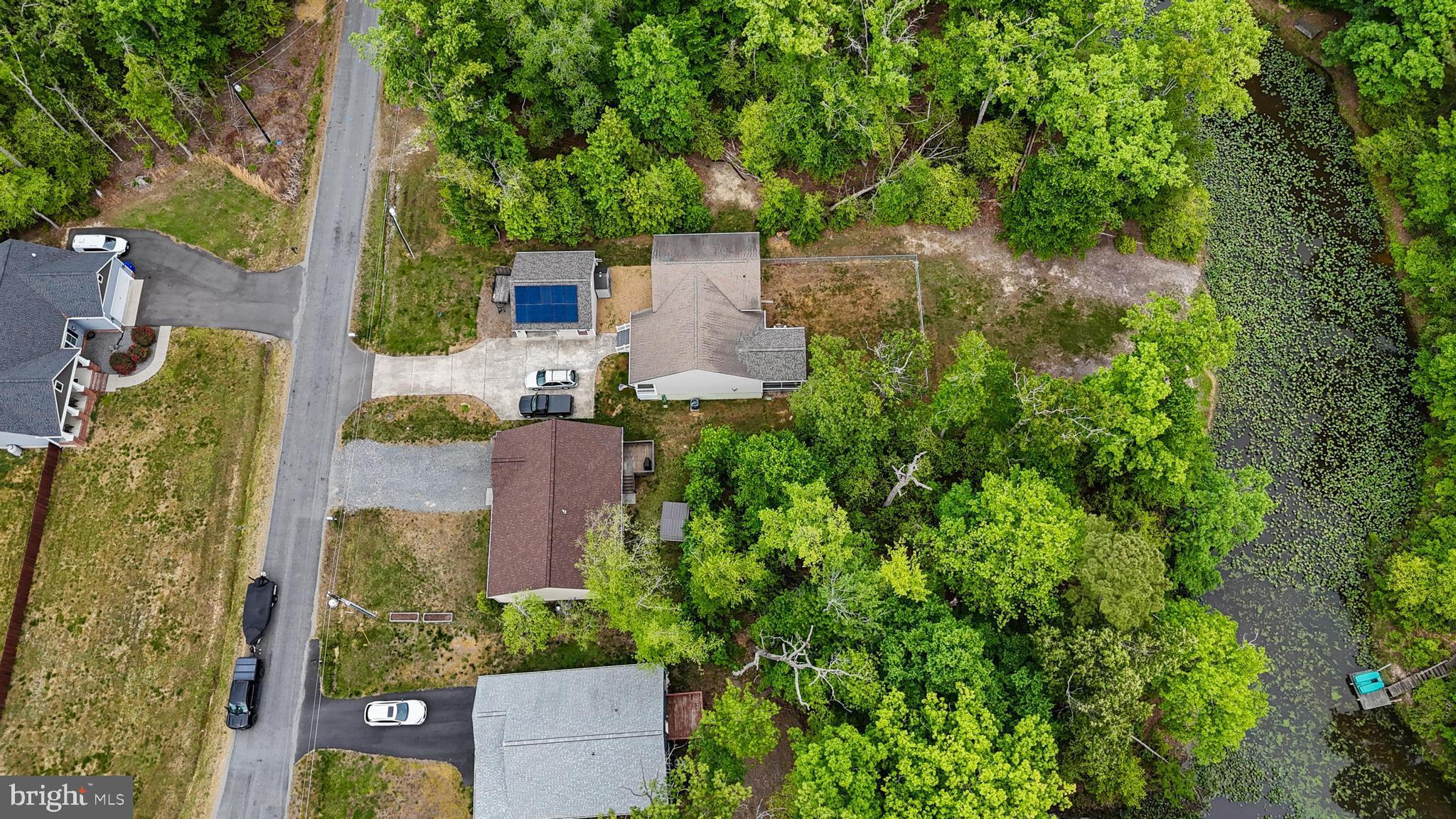 32 Placid Road Colonial Beach, VA 22443 - Photo 42 of 54 an aerial view of a house with a yard and lake view