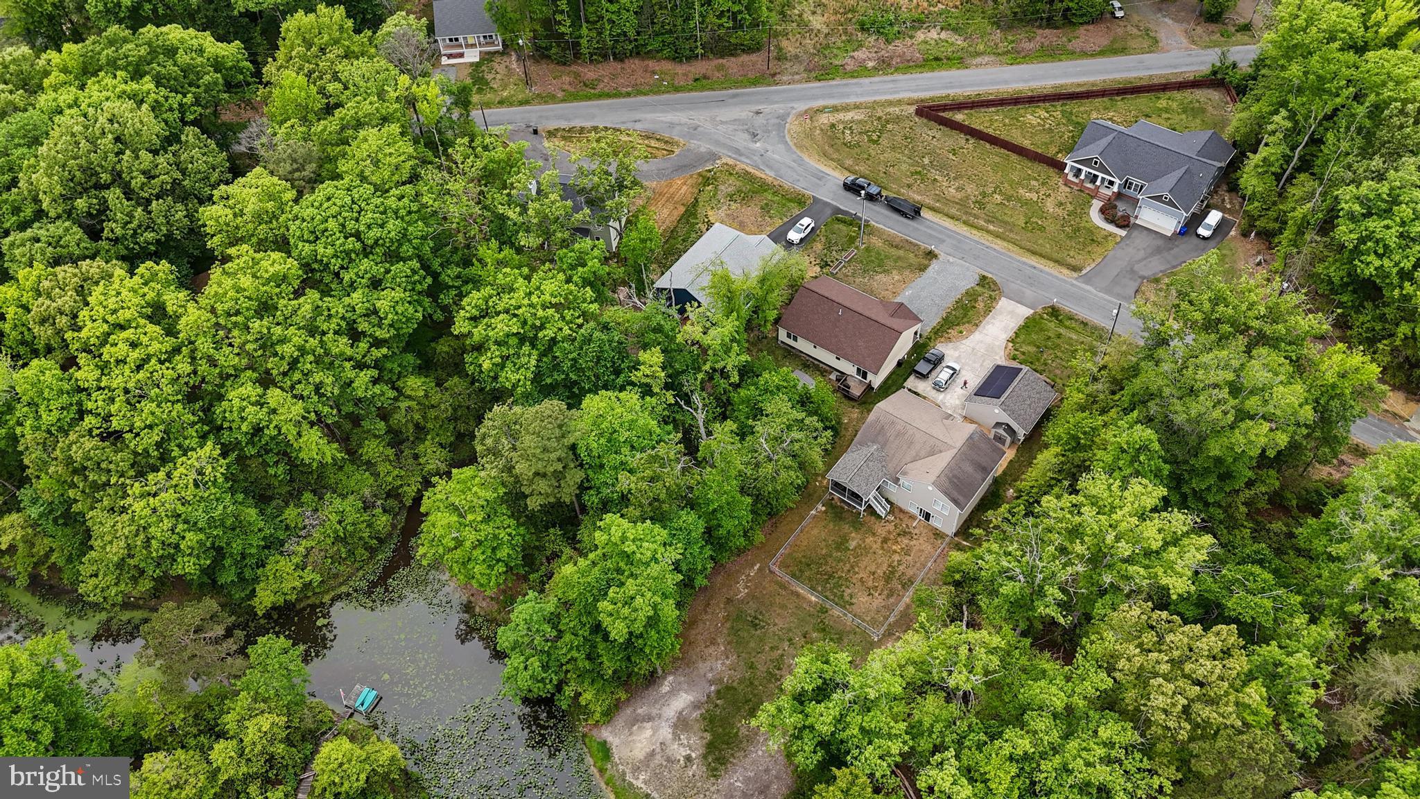 32 Placid Road Colonial Beach, VA 22443 - Photo 44 of 54 an aerial view of a house with a yard