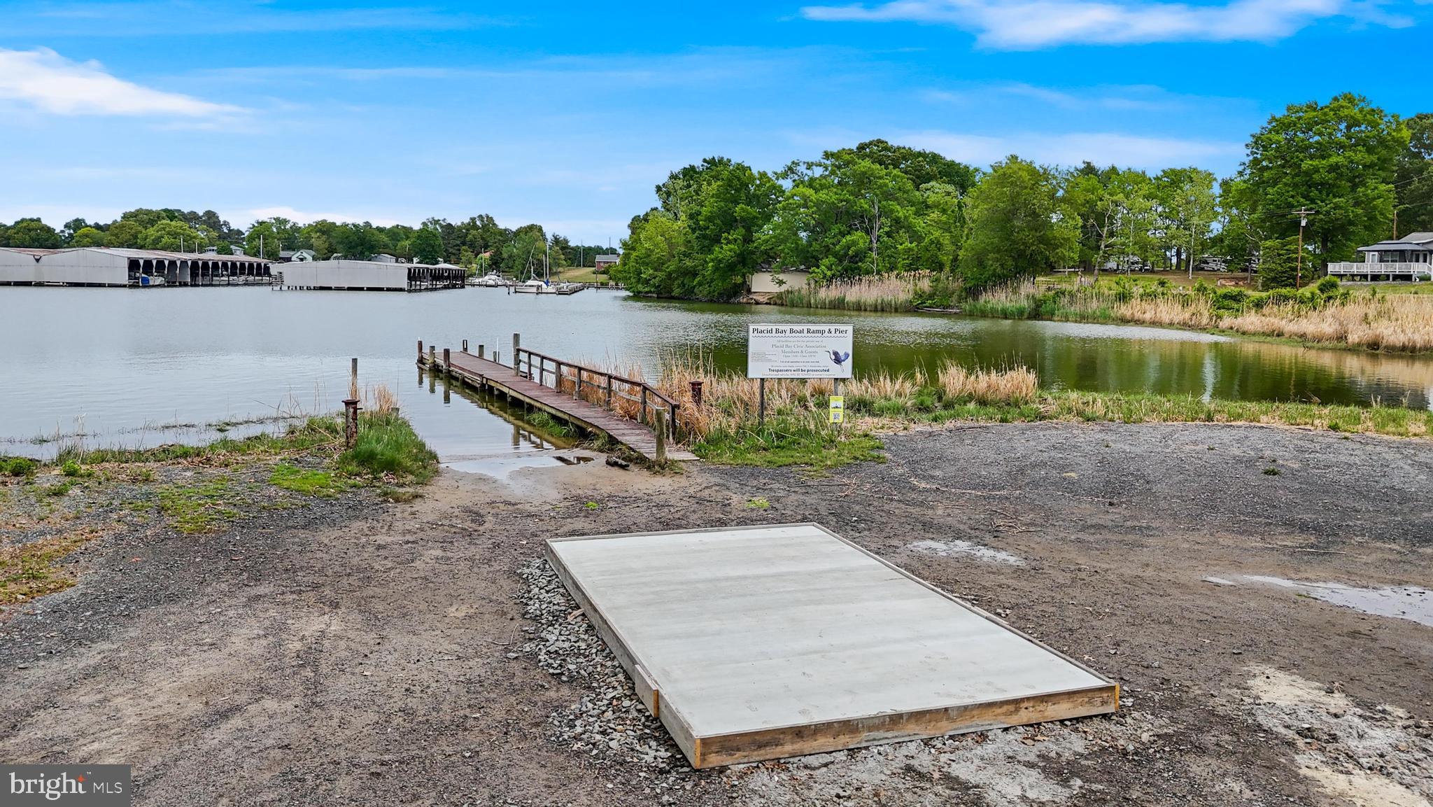32 Placid Road Colonial Beach, VA 22443 - Photo 50 of 54 a view of a lake with houses in the back