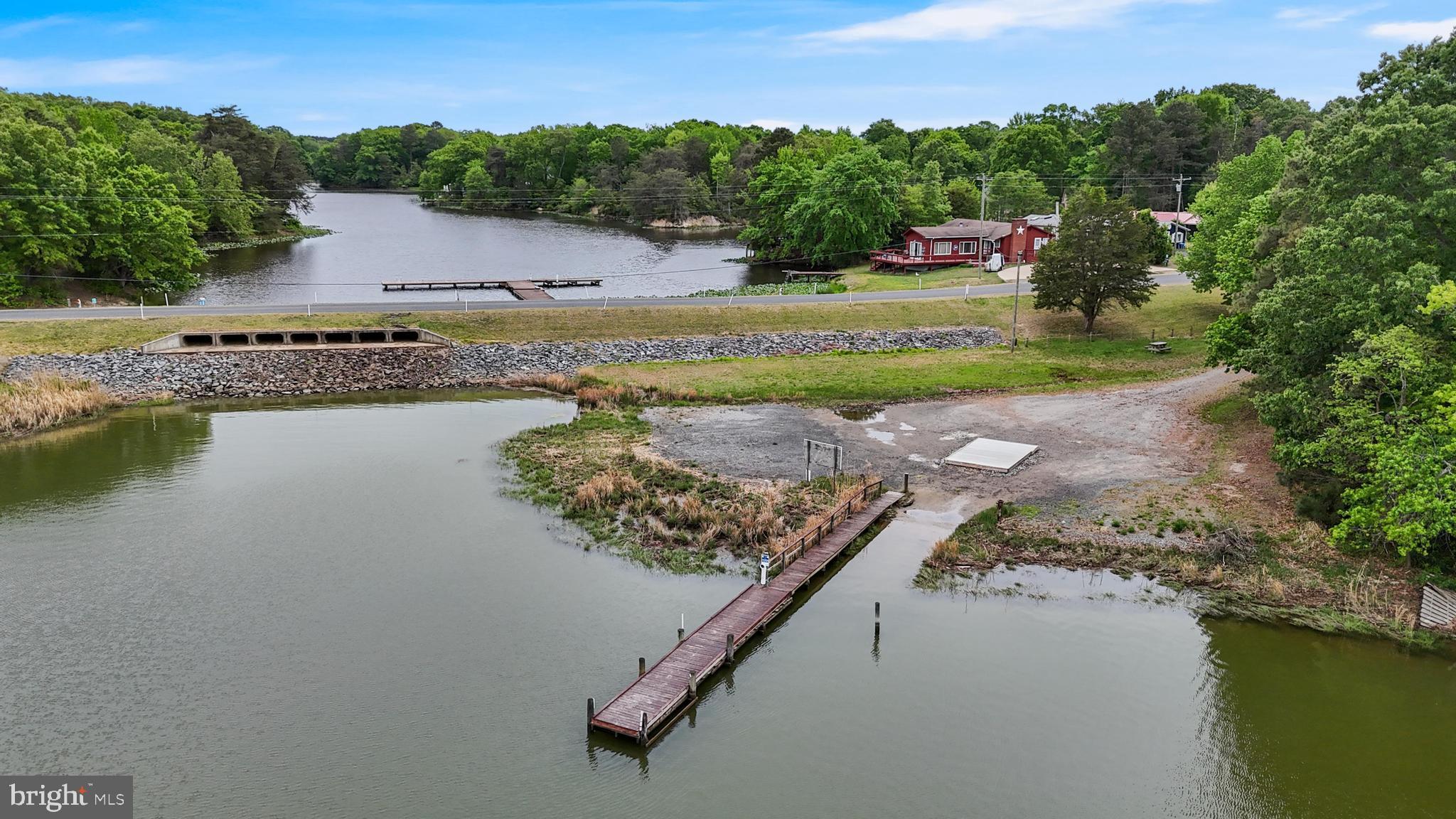 32 Placid Road Colonial Beach, VA 22443 - Photo 53 of 54 a view of a lake with a mountain in the background
