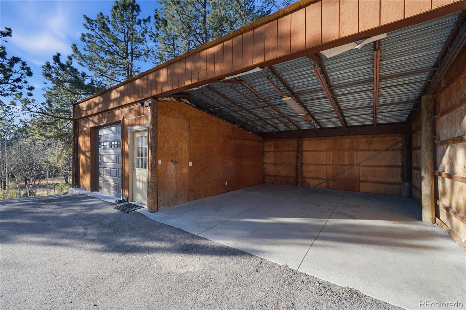 33799 Warren Road Pine, CO 80470 - Photo 8 of 50 a view of a car parking garage