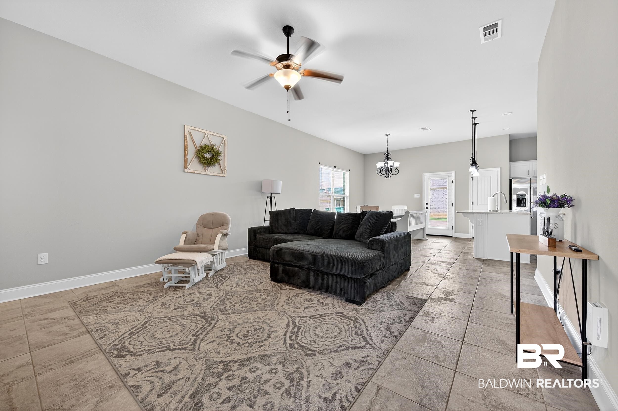 1084 Stella Road Foley, AL 36535 - Photo 5 of 31 Living area featuring a ceiling fan and suspended lighting