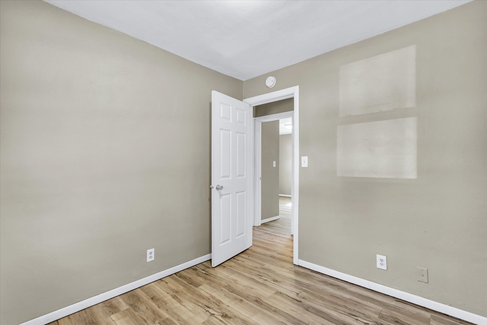 4 Hedge Court Champaign, IL 61821 - Photo 19 of 23 a view of room with wooden floor