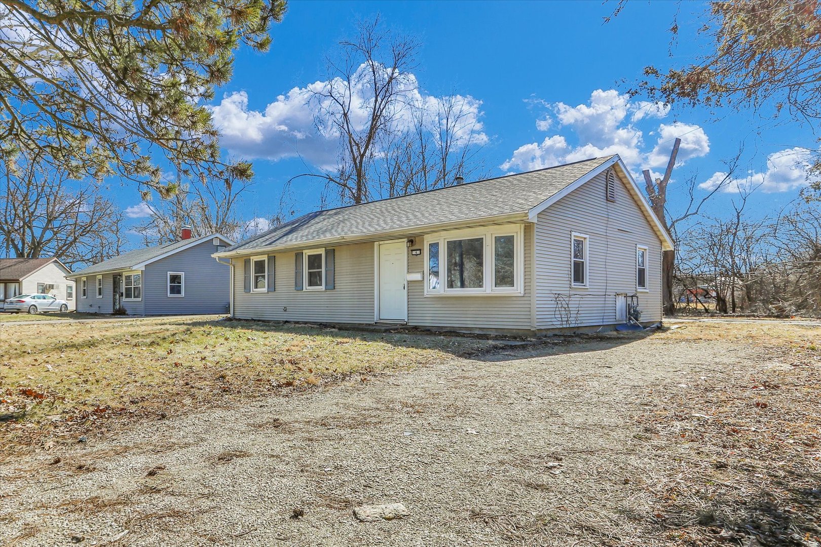 4 Hedge Court Champaign, IL 61821 - Photo 2 of 23 a view of a house with a yard
