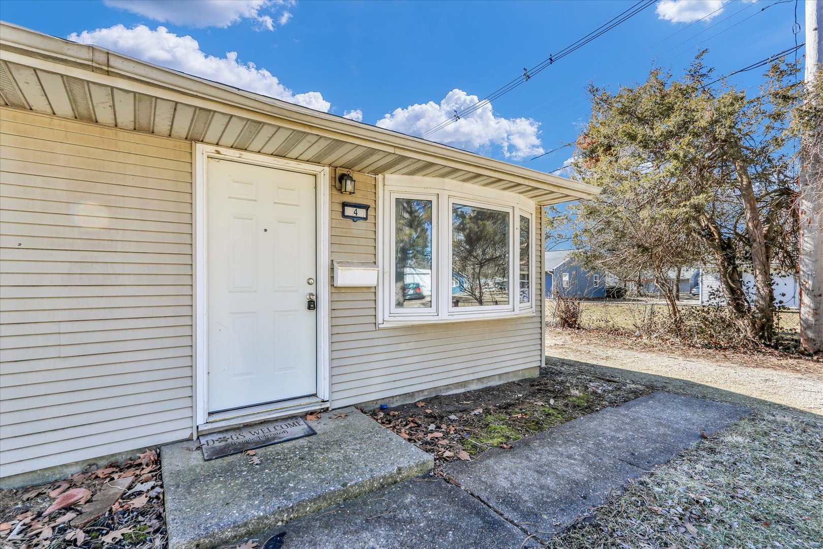 4 Hedge Court Champaign, IL 61821 - Photo 4 of 23 a view of a house with a yard