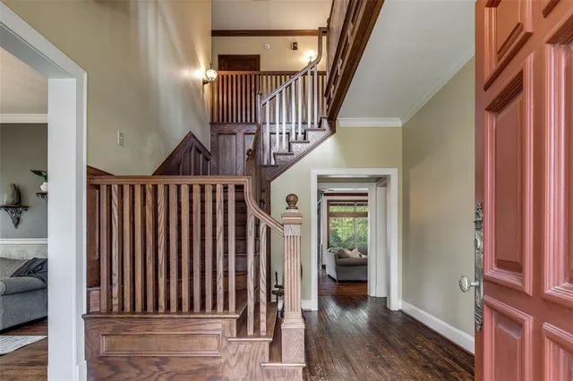 a bathroom with a sink a mirror a toilet and a shower