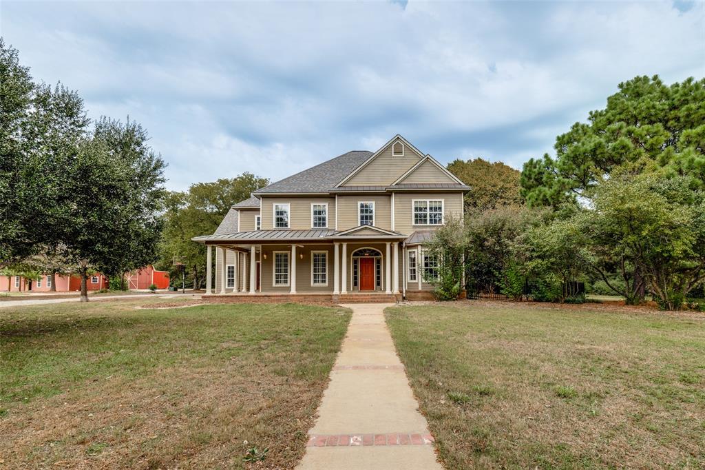 1833 Dr Sanders Road Cross Roads, TX 76227 - Photo 3 of 40 Stunning custom home with charming front porch to watch the beautiful Texas Sunset.