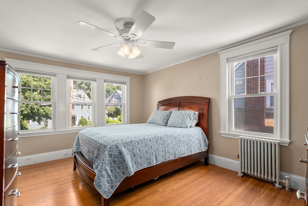27 Frothingham Street Milton, MA 02186 - Photo 17 of 32 a bedroom with a large bed and a window