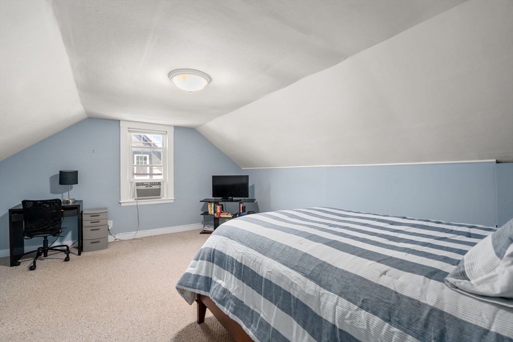 27 Frothingham Street Milton, MA 02186 - Photo 22 of 32 a bedroom with a bed and a window