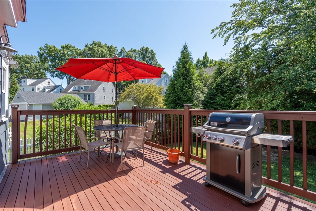 27 Frothingham Street Milton, MA 02186 - Photo 28 of 32 a balcony with wooden floor table and chairs