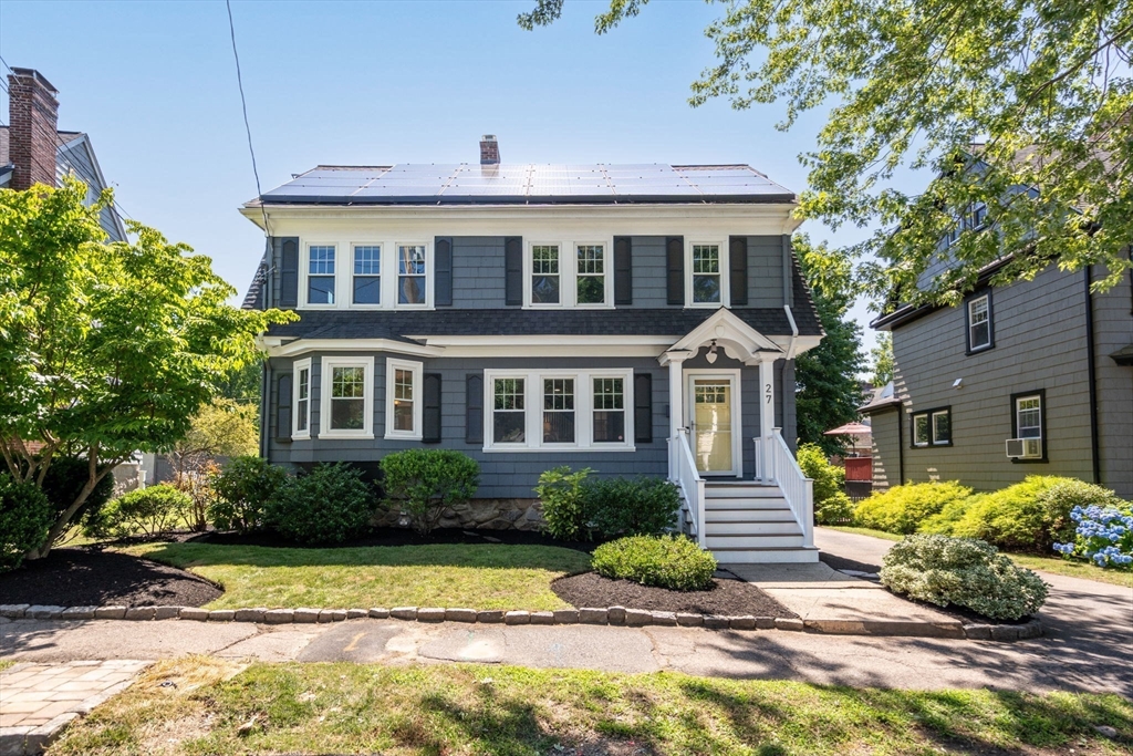 27 Frothingham Street Milton, MA 02186 - Photo 32 of 32 a front view of a house with a yard and a garden