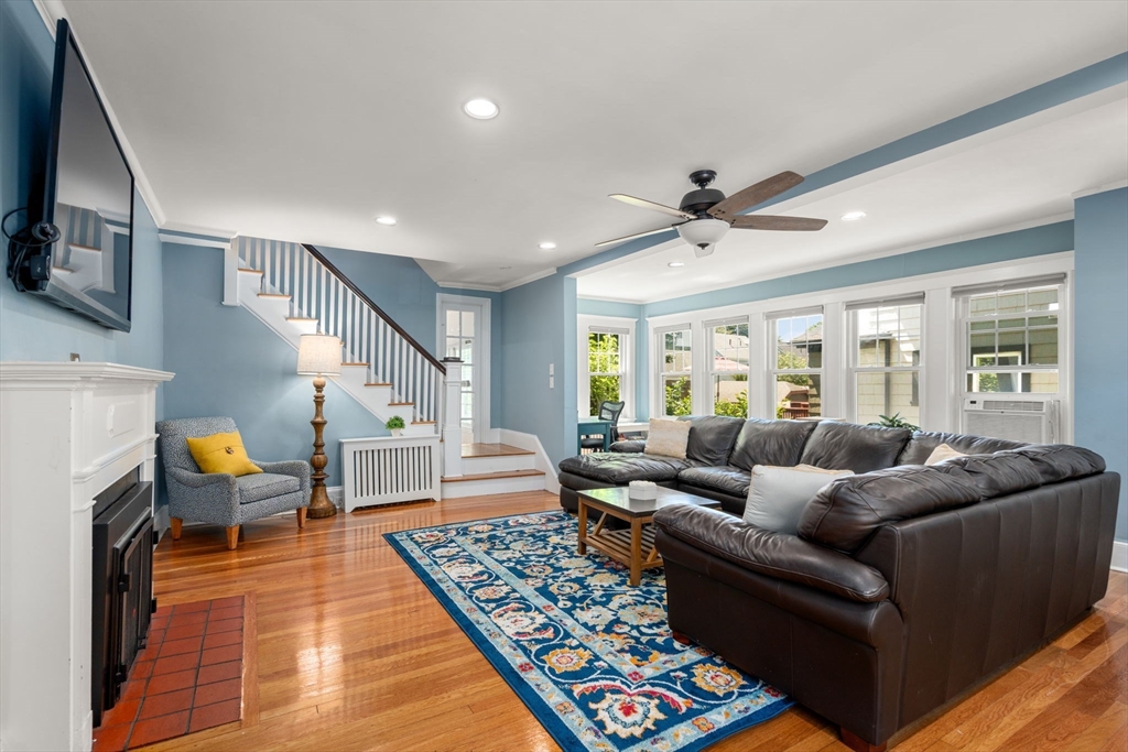 27 Frothingham Street Milton, MA 02186 - Photo 5 of 32 a living room with furniture and a rug