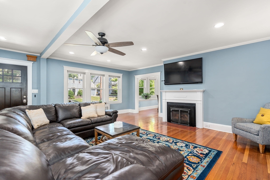 27 Frothingham Street Milton, MA 02186 - Photo 6 of 32 a living room with furniture fireplace and flat screen tv