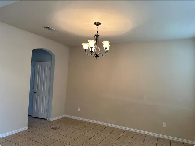 a view of a chandelier in a room