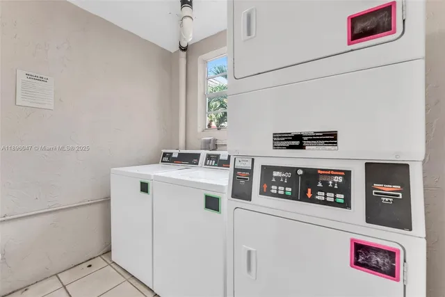 a balcony with wide window and wooden floor