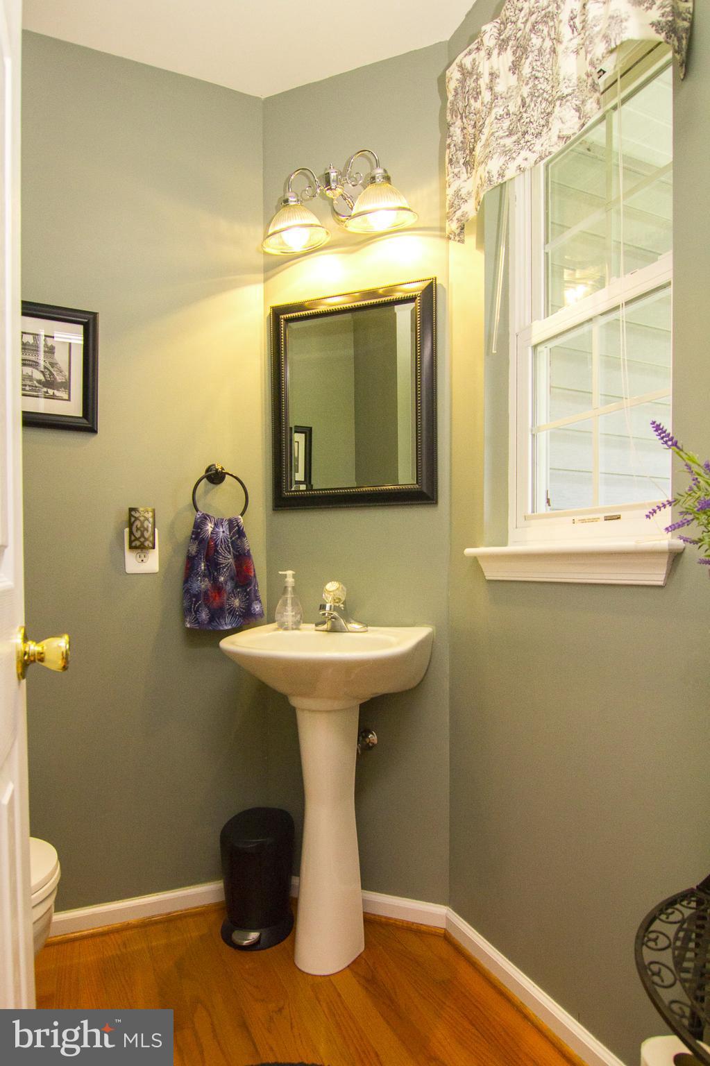 107 Trevanion Road Taneytown, MD 21787 - Photo 14 of 30 a bathroom with a sink and a toilet