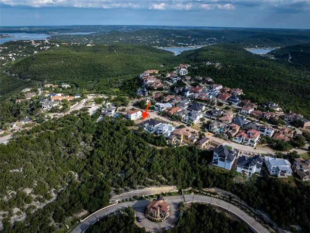 a view of a city and mountains ocean view