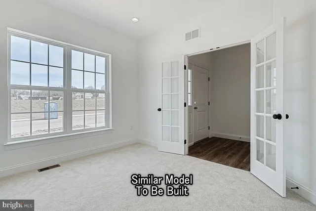 a view of kitchen and wooden floor
