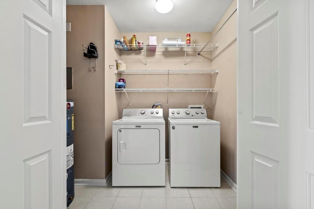 3334 Peachtree Road Northeast, Unit 1207 Atlanta, GA 30326 - Photo 17 of 25 a utility room with dryer and washer