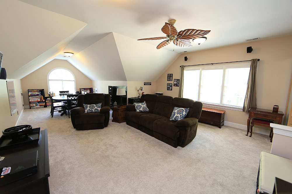 9101 Tealby Place Raleigh, NC 27615 - Photo 24 of 30 Bonus Room with back stair, ceiling fan, separate alcove area and new carpet floors. Bonus Room