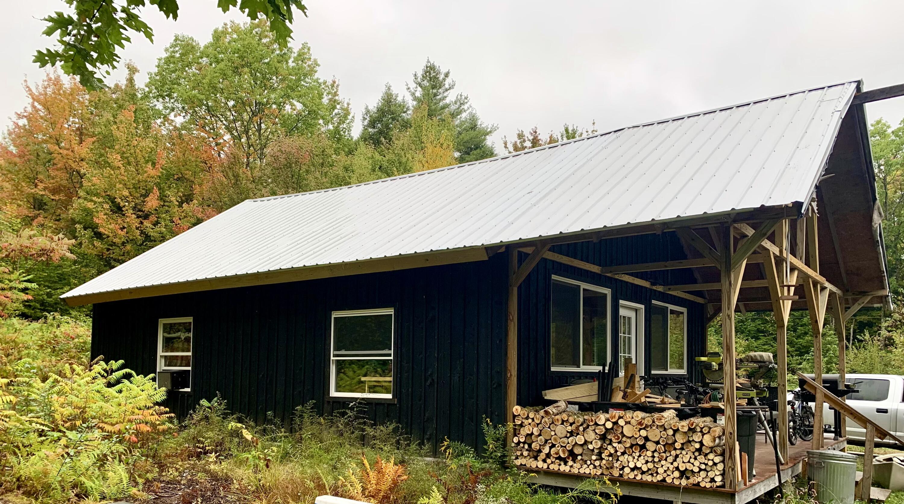 265 Mile Hill Road New Sharon, ME 04955 - Photo 3 of 20 Side of home