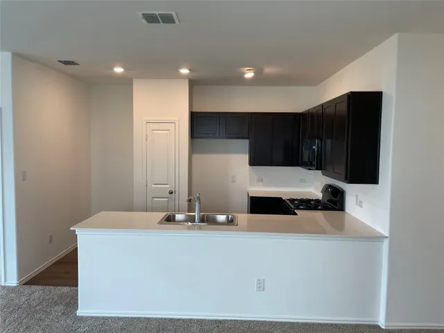a view of a livingroom with a staircase