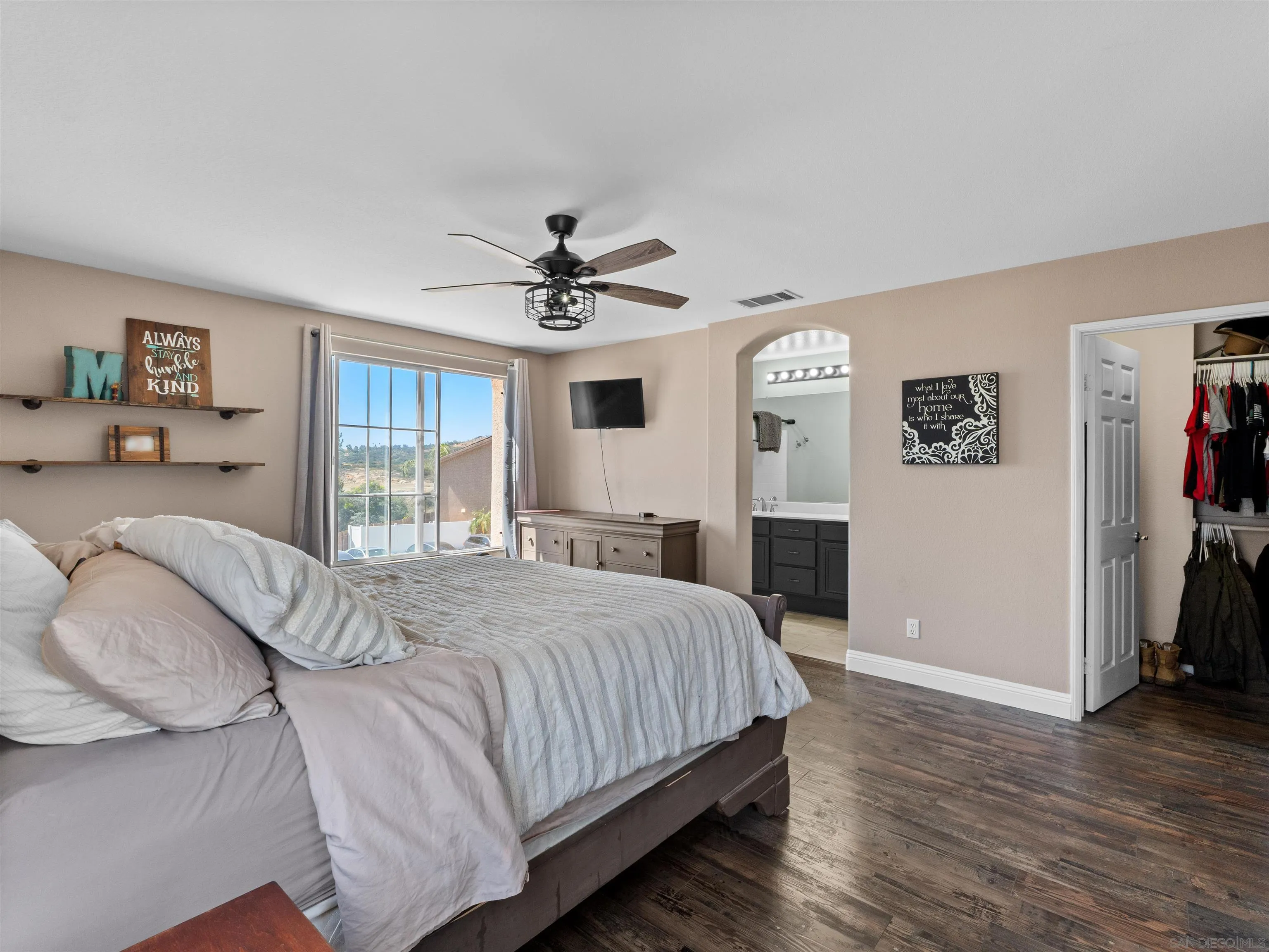 2925 Sunhaven Court Alpine, CA 91901 - Photo 11 of 19 a bedroom with a large bed and a window