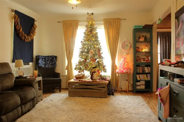 a living room with furniture and a table