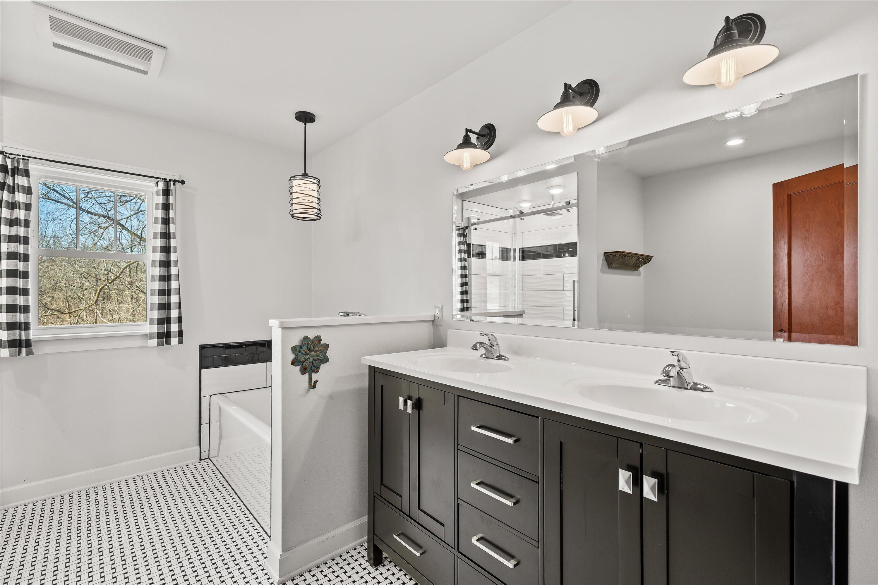 N7243 North Crystal Lake Road Beaver Dam, WI 53916 - Photo 19 of 46 Upper Full Bath w/Stunning Tilework!