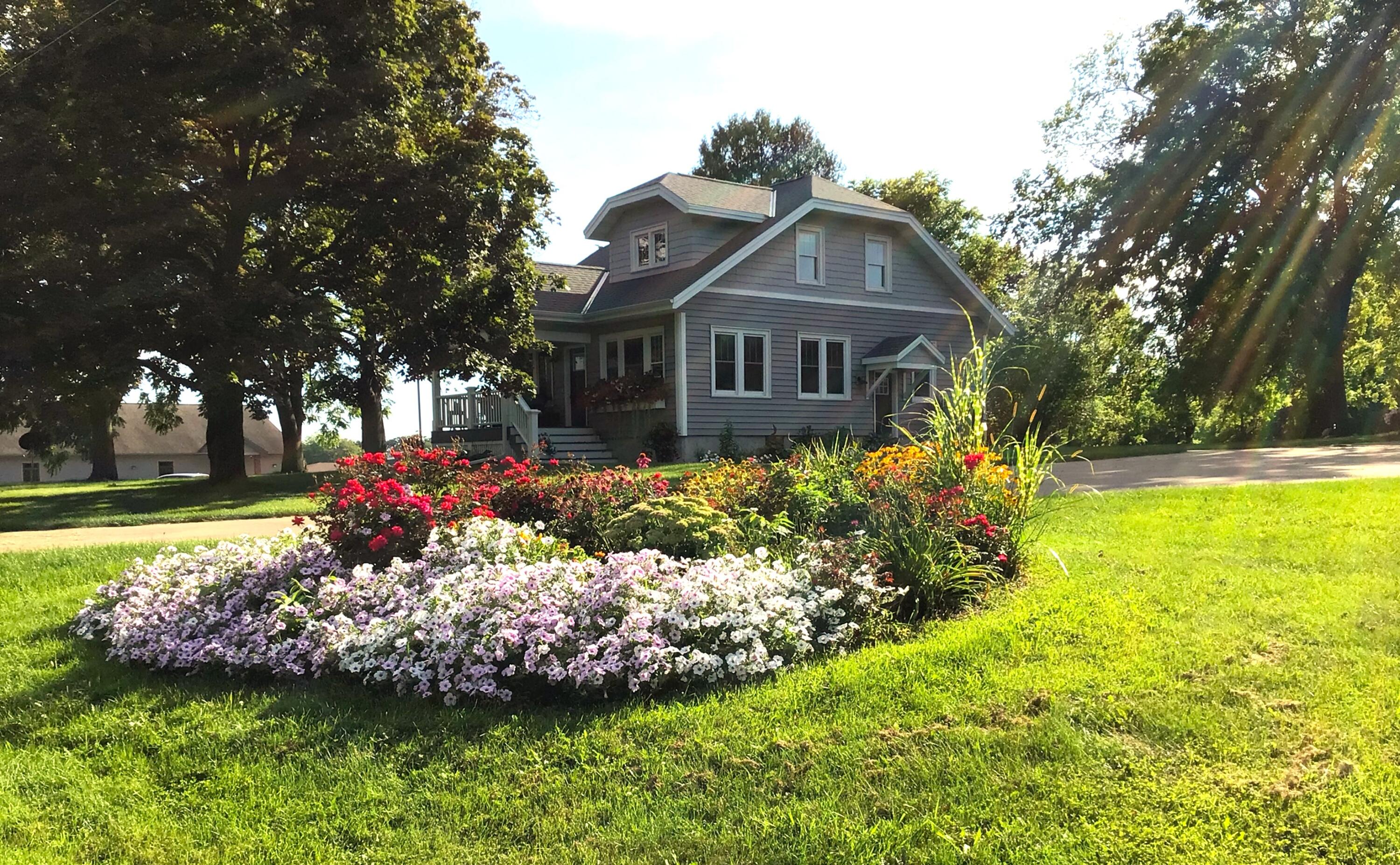 N7243 North Crystal Lake Road Beaver Dam, WI 53916 - Photo 32 of 46 So Many Perennial Beds!