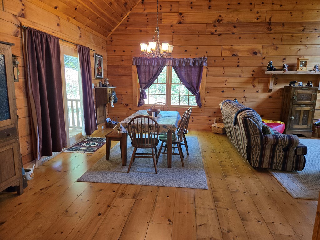586 Laurel Haven Road Hayesville, NC 28904 - Photo 18 of 34 a view of a dining room with furniture and window