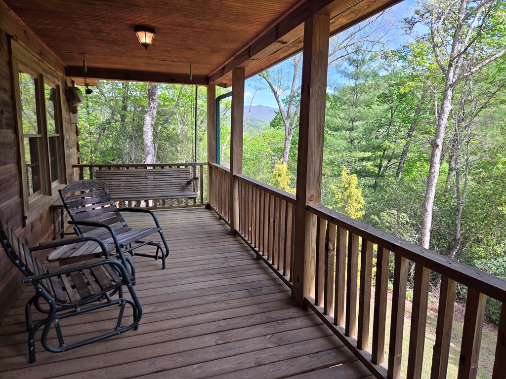 586 Laurel Haven Road Hayesville, NC 28904 - Photo 5 of 34 a view of a patio with wooden floor