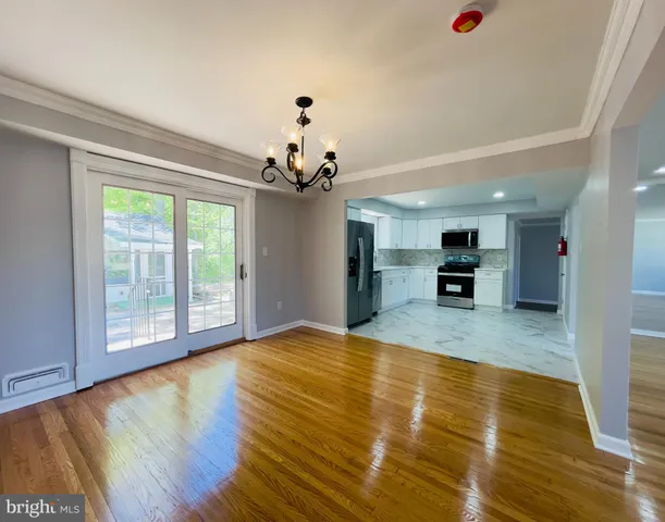 a view of kitchen and windows