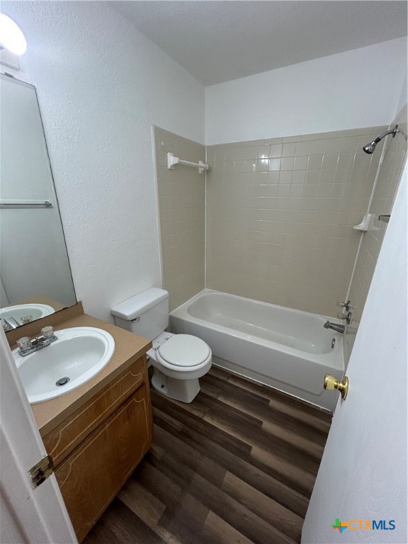 3805 Woodrow Drive, Unit C Killeen, TX 76549 - Photo 6 of 8 a bathroom with a sink a toilet and a bathtub