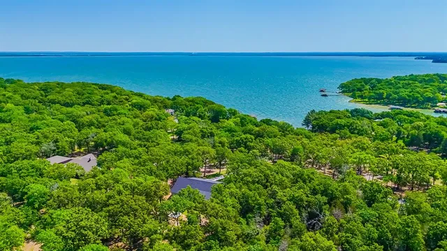 a view of a lake and a yard